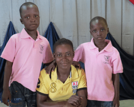 Blessing right after being reunited with her two boys.