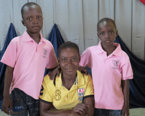 Blessing right after being reunited with her two boys.